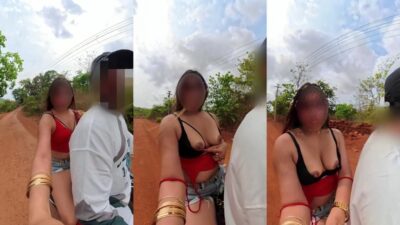 Busty Jaslin flashes her perky boobs on a moving scooty in public Goa streets